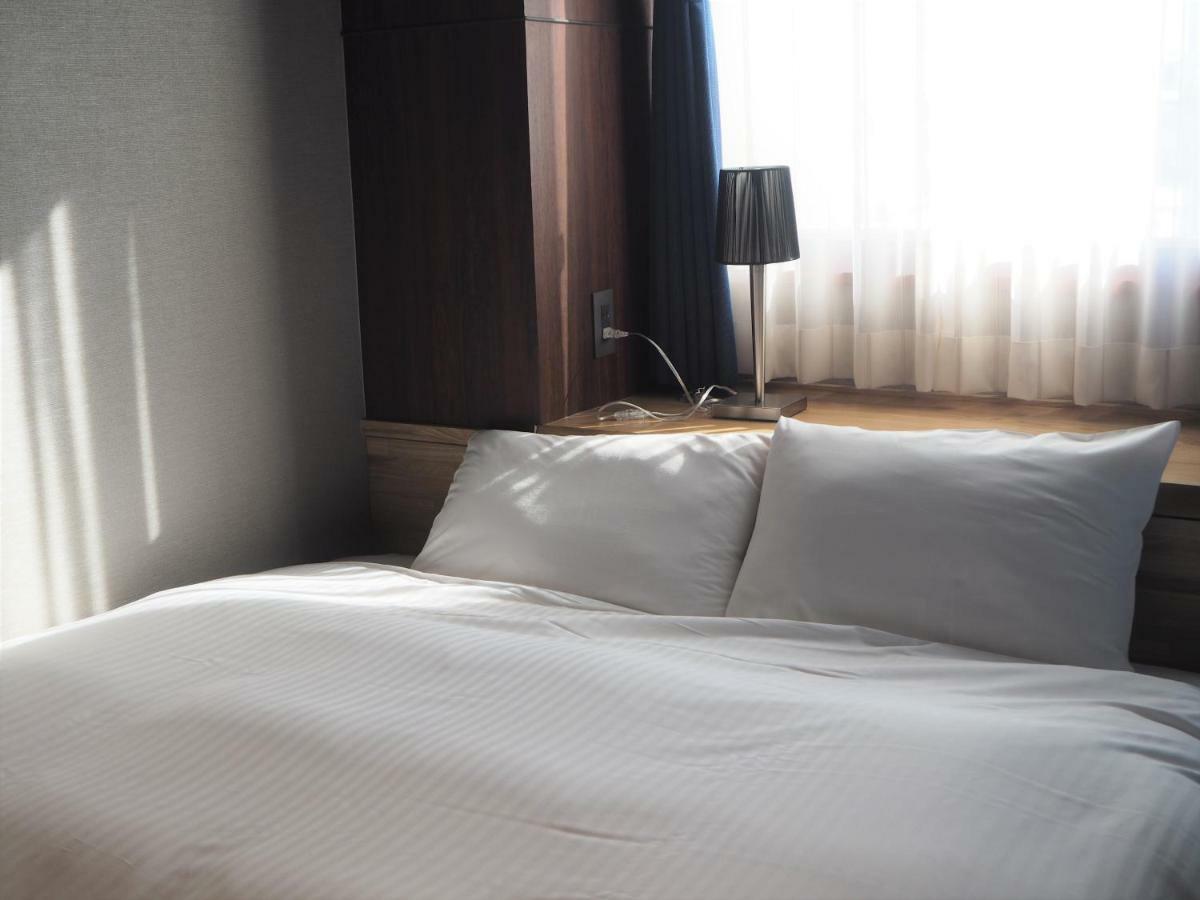 Kojohama Onsen Hotel Shiraoi Buitenkant foto